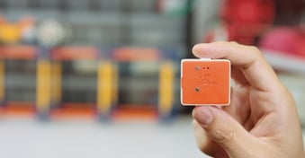 PocketLab Voyager wireless sensor held in hand, used for student-driven science experiments in K-12 classrooms